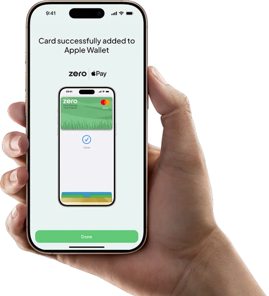 A photo of someone holding a phone which shows the Zero debit card has been added to Apple Wallet